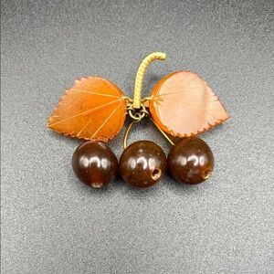 Soviet Union amber and gold plated cherry brooch